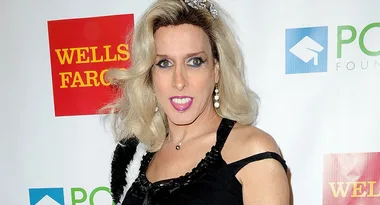 Blonde woman in a black dress with jewelry, standing in front of a Wells Fargo and PONY Foundation backdrop.