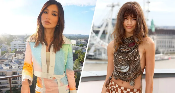 Two women posing outdoors; one in a pastel jacket, the other in a metal chain top. Cityscape backgrounds visible.