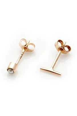 Rose gold minimalist T-bar and round earrings on white background.