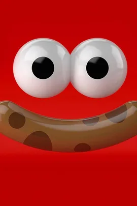 Googly eyes and a curved sausage-like mouth with spots on a red background, resembling a playful, happy face.