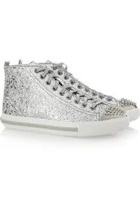 Silver glitter high-top sneakers with studded toe caps, featuring white laces and soles.