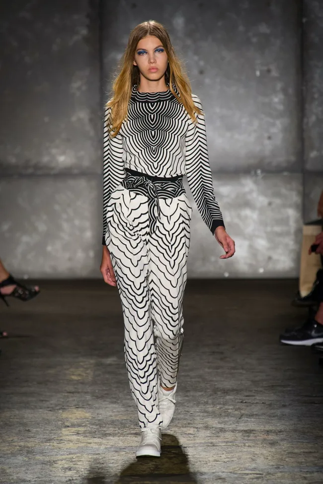 Model in a monochrome patterned outfit walks the runway at Marc by Marc Jacobs SS14 fashion show.