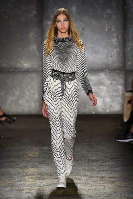 Model in a monochrome patterned outfit walks the runway at Marc by Marc Jacobs SS14 fashion show.