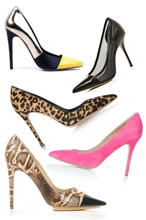 Five high heels in various styles: metallic, black patent, leopard print, pink suede, and snakeskin with a black tip.