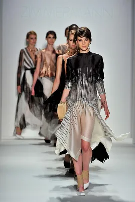 Models walking the runway showcasing Zimmermann designs at New York Fashion Week.