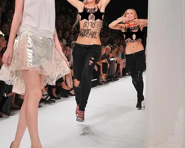 Feminist protesters at Nina Ricci show