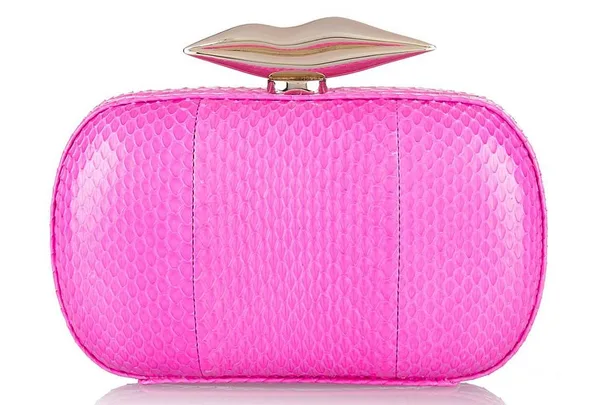 Pink textured clutch with a lip-shaped gold clasp.