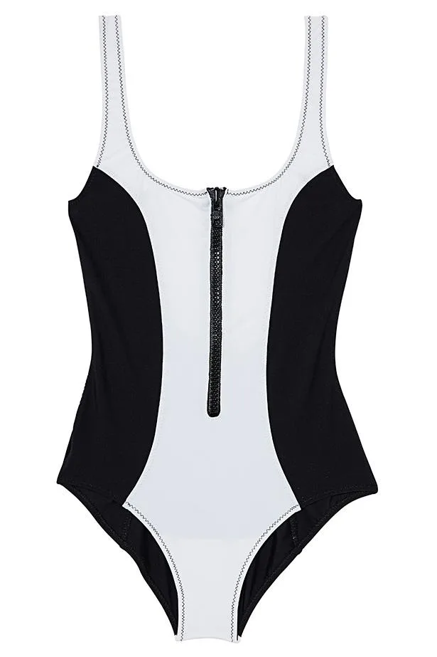 Black and white one-piece swimsuit with a front zipper and contrast stitching, featuring a sleek modern design.