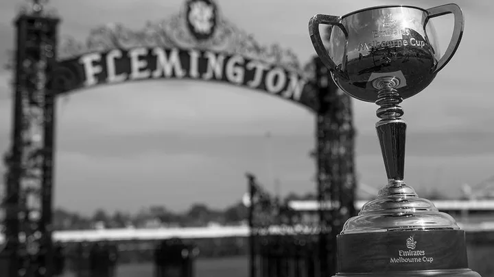 The Emirates Melbourne Cup trophy in front of the Flemington entrance gate.