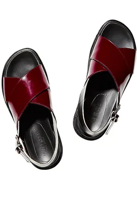 Marni burgundy leather sandals with crisscross straps and black footbed, viewed from above.