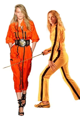 Two women in striking orange jumpsuits: left, modern runway look; right, iconic film character with sword pose.