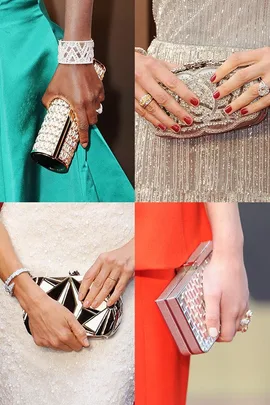 Close-up of four different clutch bags styled with elegant gowns, showcasing intricate designs and luxury jewelry.