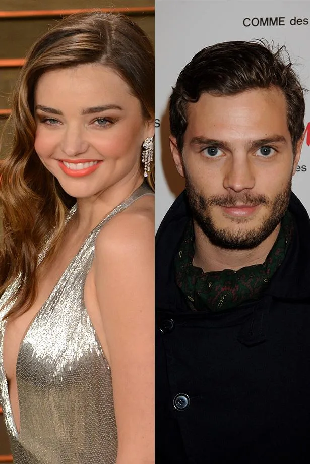 ```plaintext
Two individuals side by side; a woman in a silver dress and a man in a dark coat.
```
