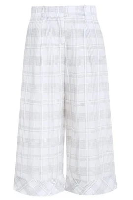 White check patterned wide-leg pants with a high waist and cuffed hems.