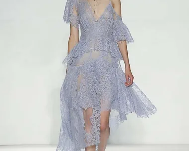 Model in a lavender lace dress walks the runway at Zimmermann Spring/Summer 2015 fashion show.