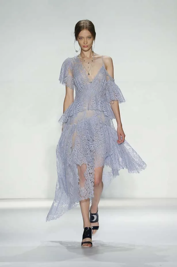 Model in a lavender lace dress walks the runway at Zimmermann Spring/Summer 2015 fashion show.