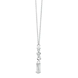 Silver necklace with a vertical pendant featuring a round gem, twisted design, and elongated gemstone at the end.