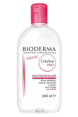 Bottle of Bioderma Créaline H2O micellar water with red cap, 500 ml size, for sensitive skin.