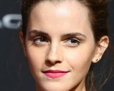 Emma Watson wearing gold jewellery