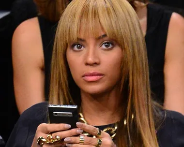 Beyonce with her phone