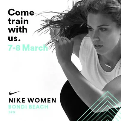 Woman in athletic gear with text "Come train with us. 7-8 March" at Nike Women event in Bondi Beach, SYD.