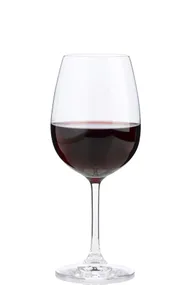 A glass of red wine filled halfway on a white background.