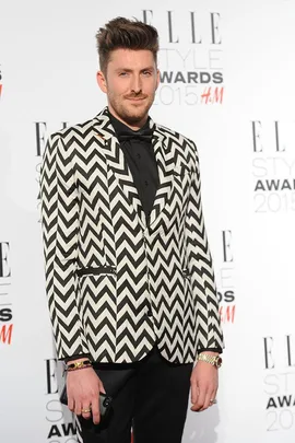 Person in a black and white zigzag blazer at Elle Style Awards 2015.