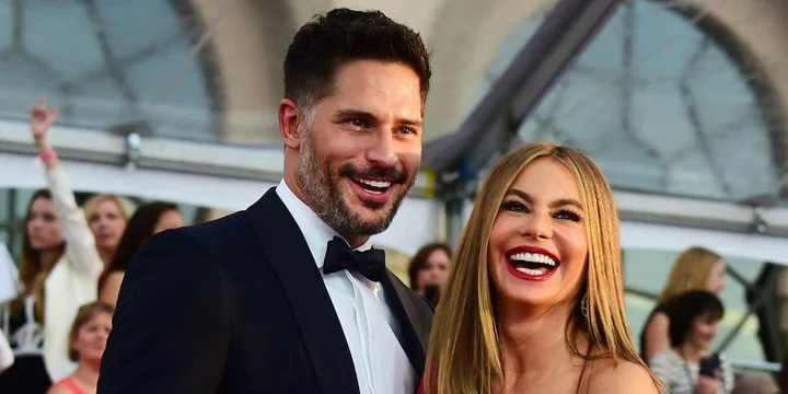 Joe Manganiello and Sofia Vergara smiling in formal attire at an event.