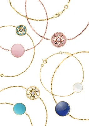 "Dior Rose des Vents collection bracelets in various colored gemstones and gold chains."