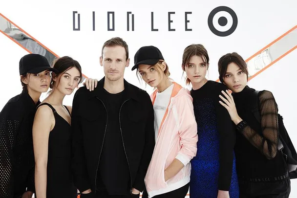 Group photo with Dion Lee and models posing in front of Dion Lee and Target collaboration logo.