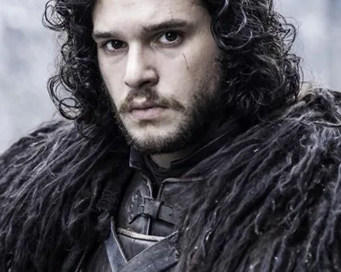 "Game of Thrones character Jon Snow in fur coat, looking serious, with a scar on his face and curly hair"