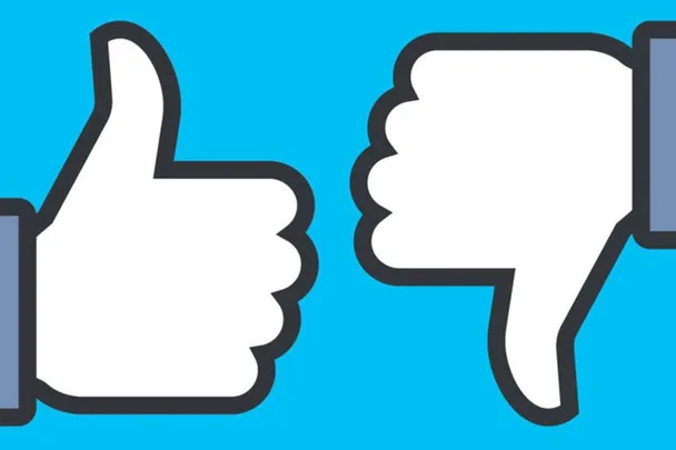 "Illustration of a thumbs-up and a thumbs-down on a blue background."