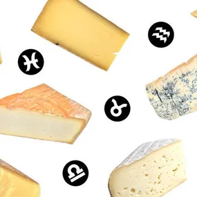 Various cheese types with zodiac symbols on a white background, illustrating "The Perfect Cheese for Your Zodiac Sign."