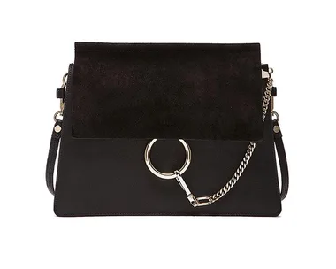 Black leather and suede Chloé handbag with metal ring and chain detail.