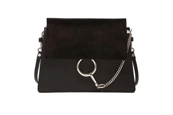 Black leather and suede Chloé handbag with metal ring and chain detail.