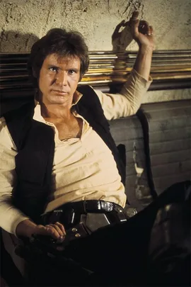 Han Solo in a casual pose, wearing a white shirt and black vest, leaning on a wall in the Star Wars setting.