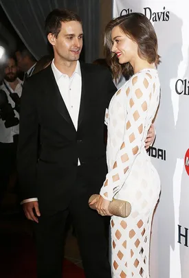 Miranda Kerr and Evan Spiegel on the pre-GRAMMYs red carpet.