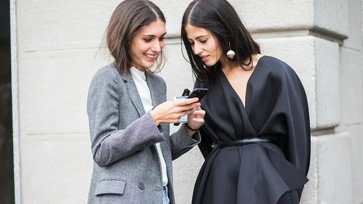 Two women together street style.