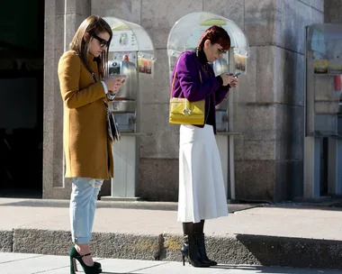 Women looking at phones