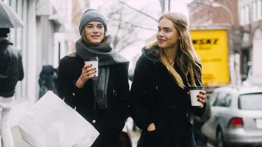 Models with coffee cups.