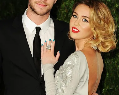 Miley Cyrus and Liam Hemsworth on the Golden Globes red carpet.