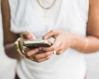 A woman uses an iPhone