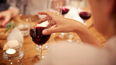 Woman drinking red wine