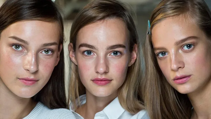 Models backstage at fashion week