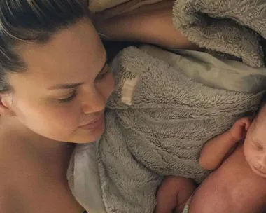 Chrissy Teigen with daughter Luna