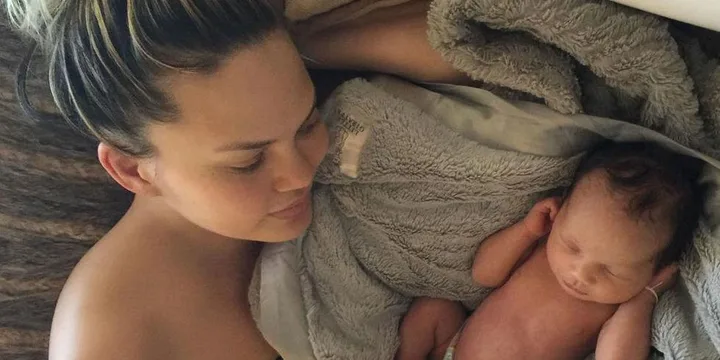 Chrissy Teigen with daughter Luna