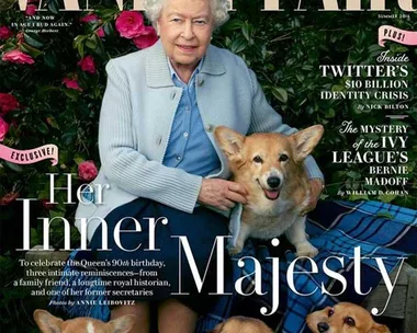 HRH Queen Elizabeth II poses with corgis Holly, Willow, Vulcan, and Candy for a portrait shot by Annie Leibovitz for Vanity Fair