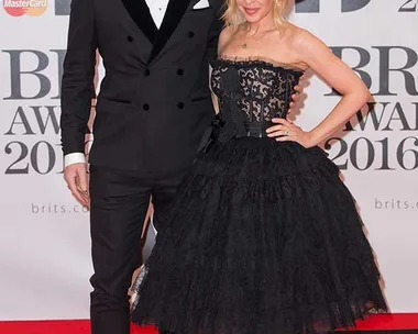 Joshua Sasse and Kylie Minogue attend the BRIT Awards 2016 at The O2 Arena on February 24, 2016 in London, England.