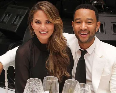 Chrissy Teigen and John Legend attend the White Party Dinner