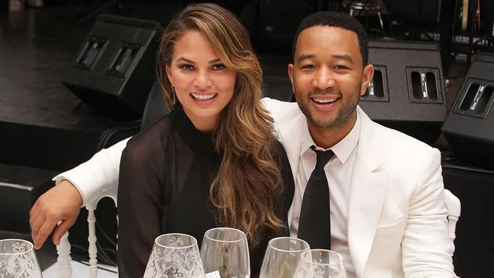 Chrissy Teigen and John Legend attend the White Party Dinner